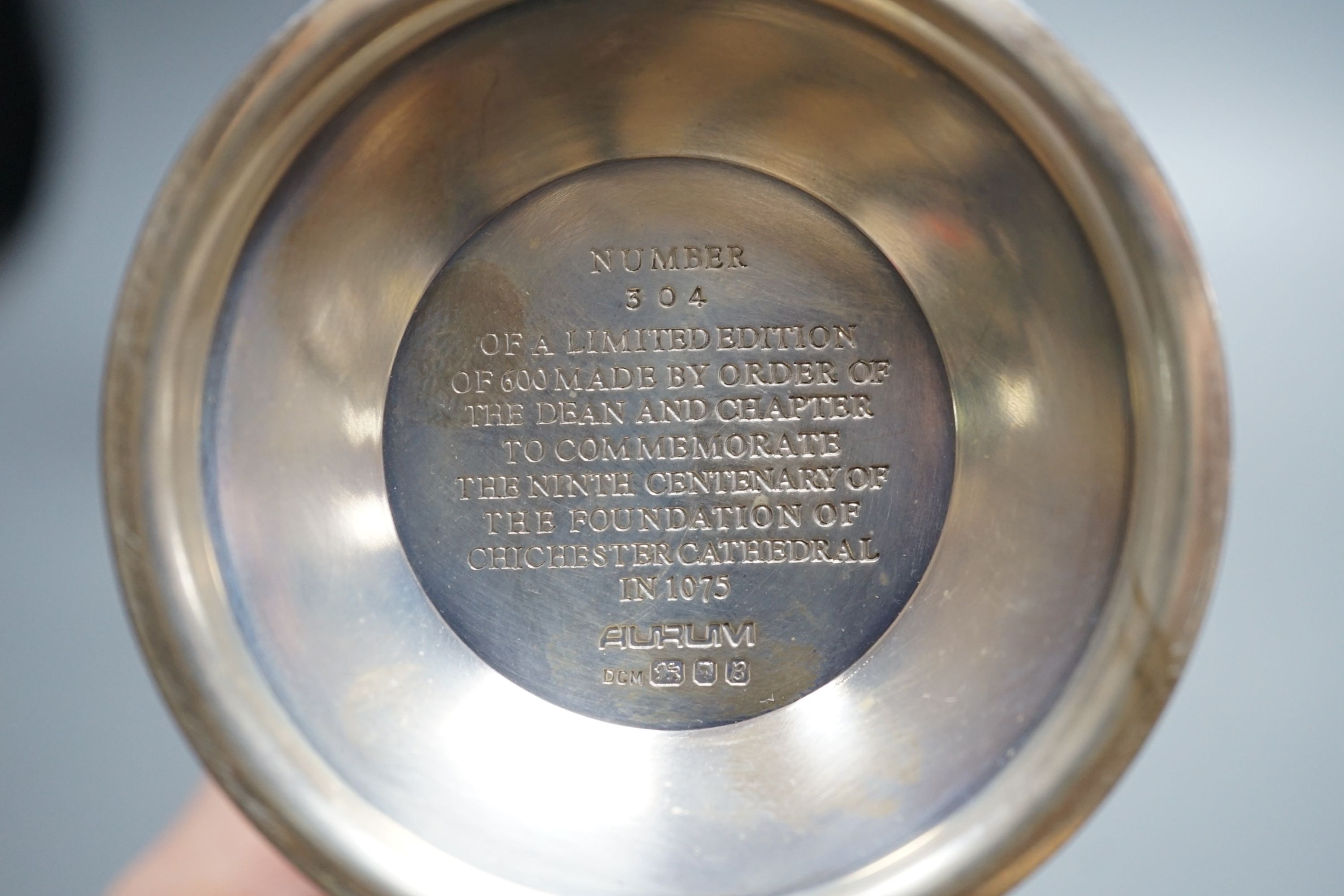 A cased modern Aurum limited edition parcel gilt silver Chichester Cathedral commemorative goblet, no. 304/600, 16.6cm